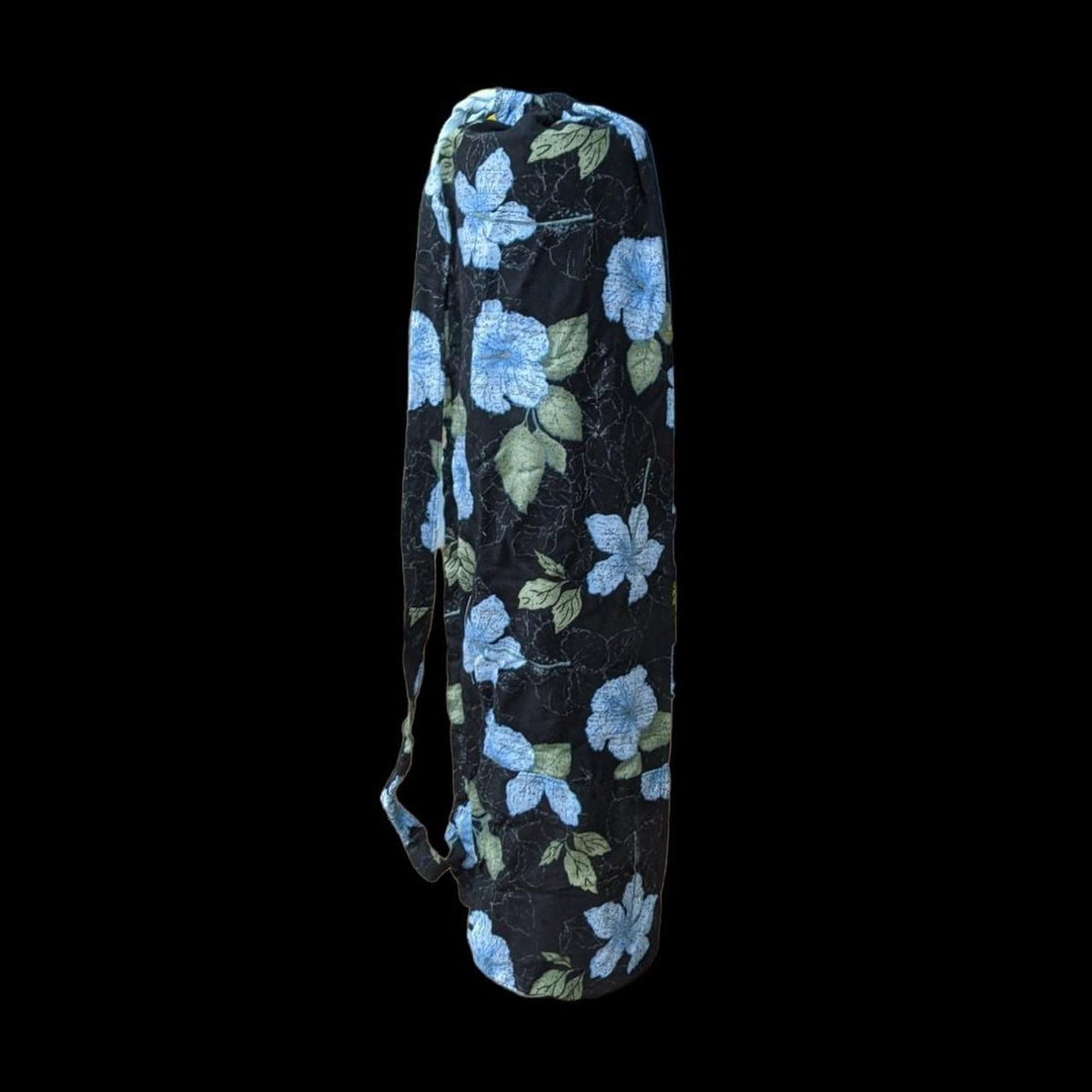 A black yoga bag with blue flowers on it.