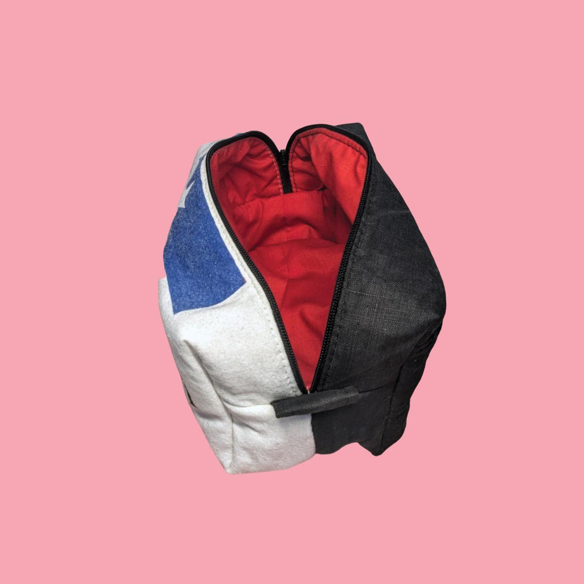 A toiletry bag with a zipper on it.