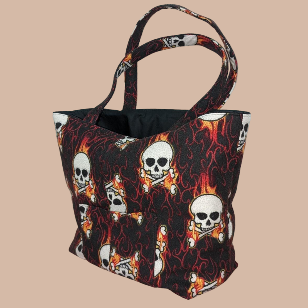 A bag with skulls on it.
