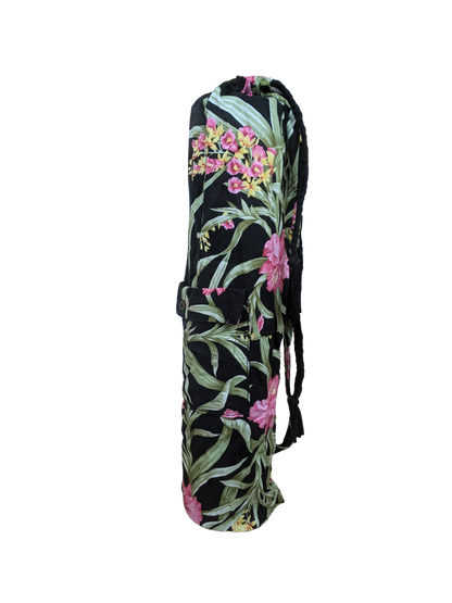 A black yoga bag with pink flowers on it.