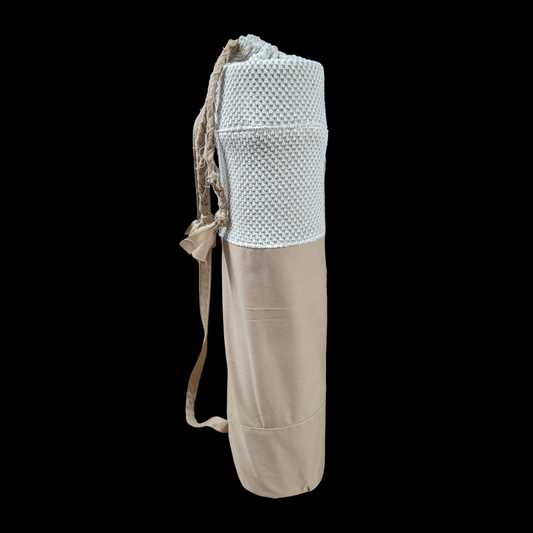 A yoga mat bag with a strap.