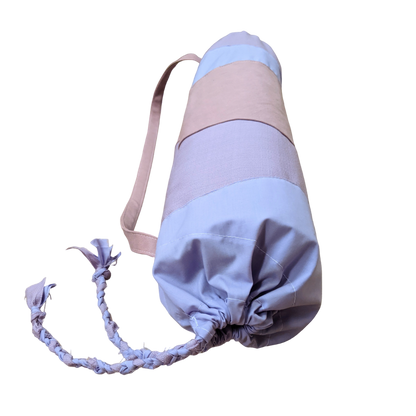A yoga bag with a pink and blue stripe on it.