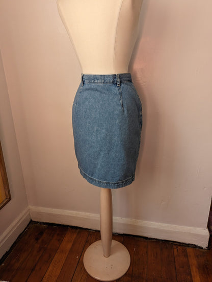 A white mannequin wearing a Reworked Embroidered Heart Skirt.