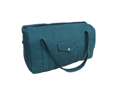 A teal tote bag on a black background.
