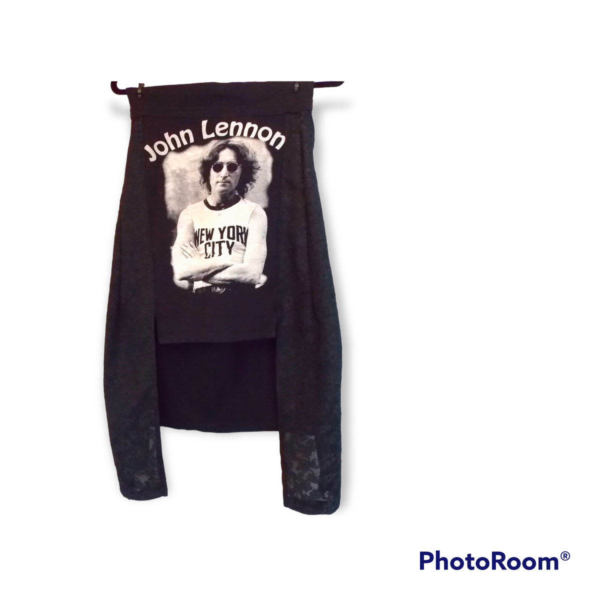 A Pop-art high low skirt with a picture of a man on it.