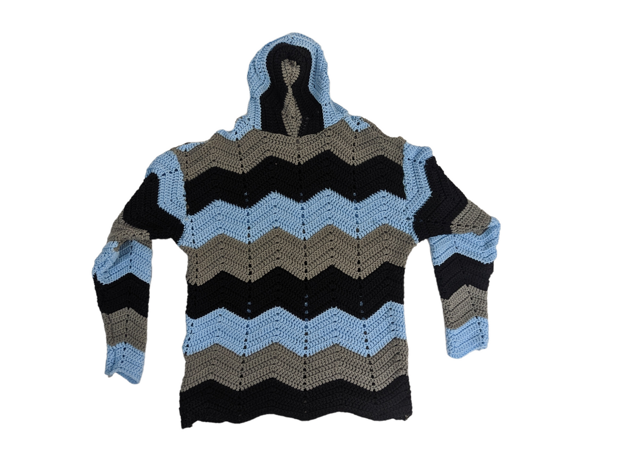 Top view of upcycled crochet hooded jacket.