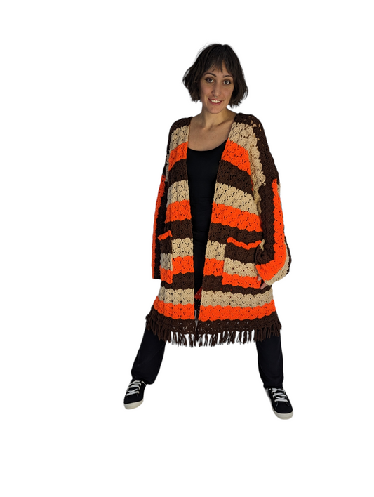 Front view of woman wearing vintage crochet cardigan.