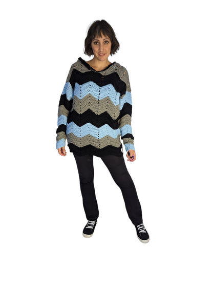 Front view of woman wearing men's crochet hoodie.