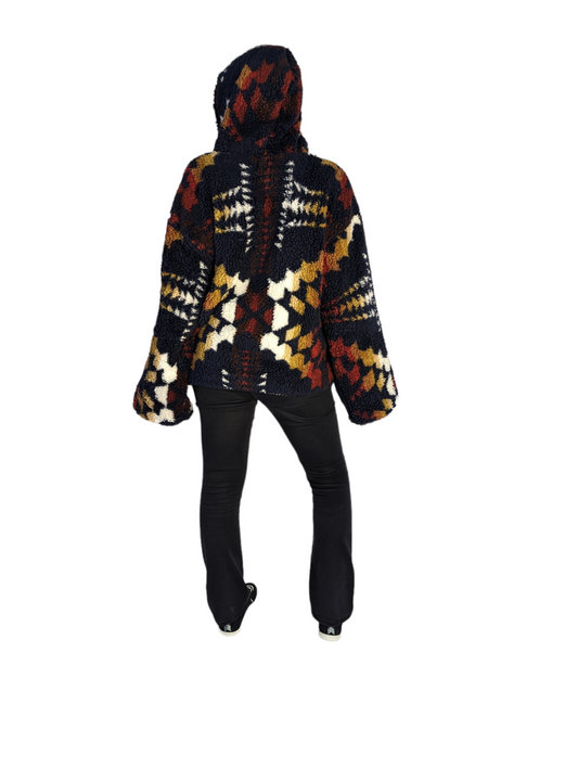 Rear view of model wearing hooded Pendleton fleece jacket.