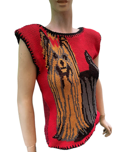 a mannequin wearing a knitted dog sweater.