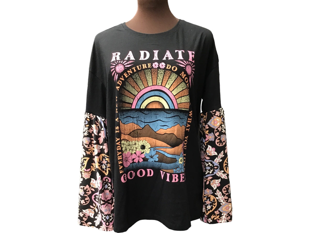 A black t - shirt with an image of a rainbow on it.