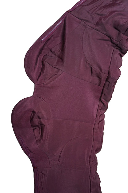 A close up of the Plum Bustier Strapless Crop Top on a white background.