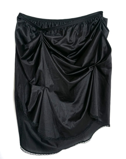 A women's LACE ICING Black Mini Skirt with ruffles on the bottom.