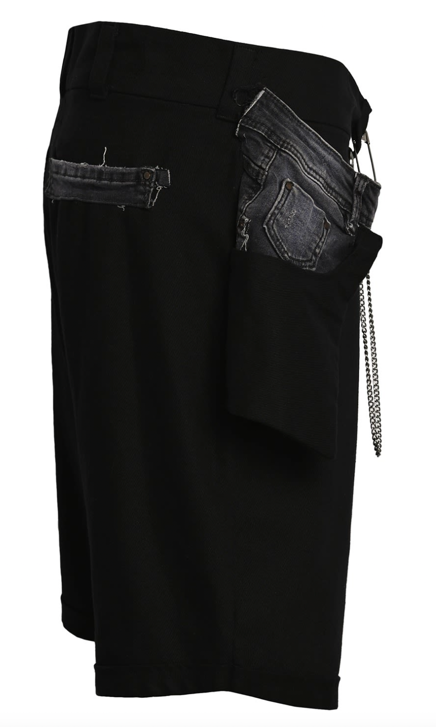 A pair of Bull Denim Up-worked Shorts with chains on them.