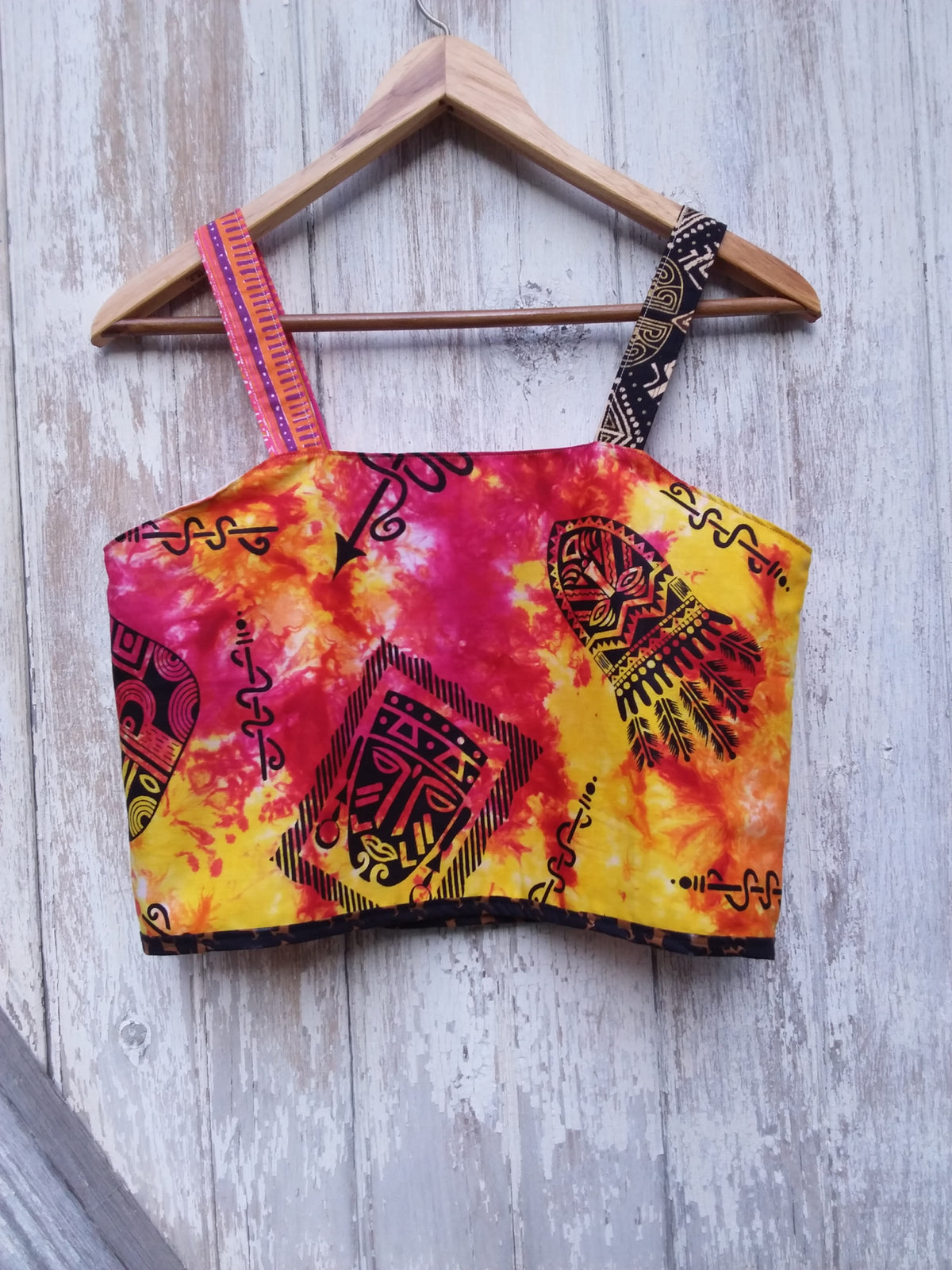 Unique upcycled tie dye crop top with stylized faces