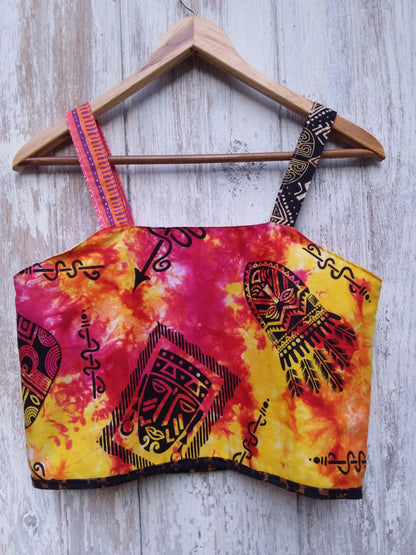 Colorful tie dye festival crop top with tribal faces