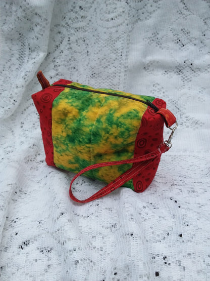 Retro Artsy wristlet handbag with key chain strap in bold red and funky batik