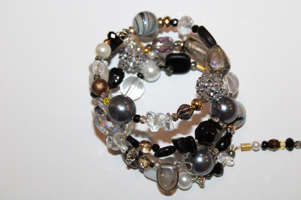 a close up of a bracelet on a table.