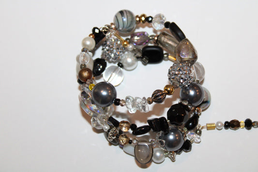 a close up of a bracelet on a table.