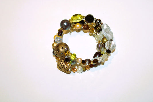 A bracelet with a lot of beads on it.