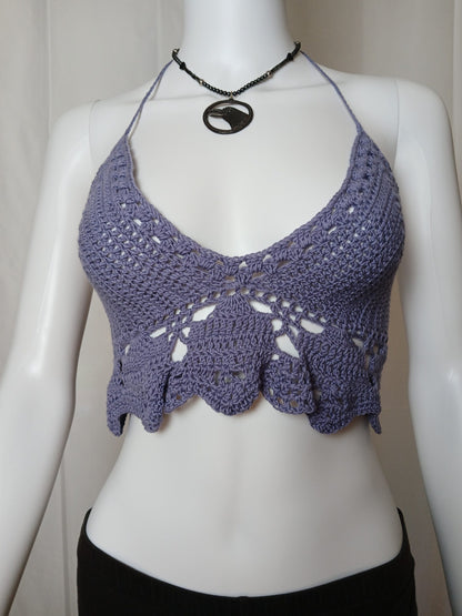 A belly dancer style purple crochet top