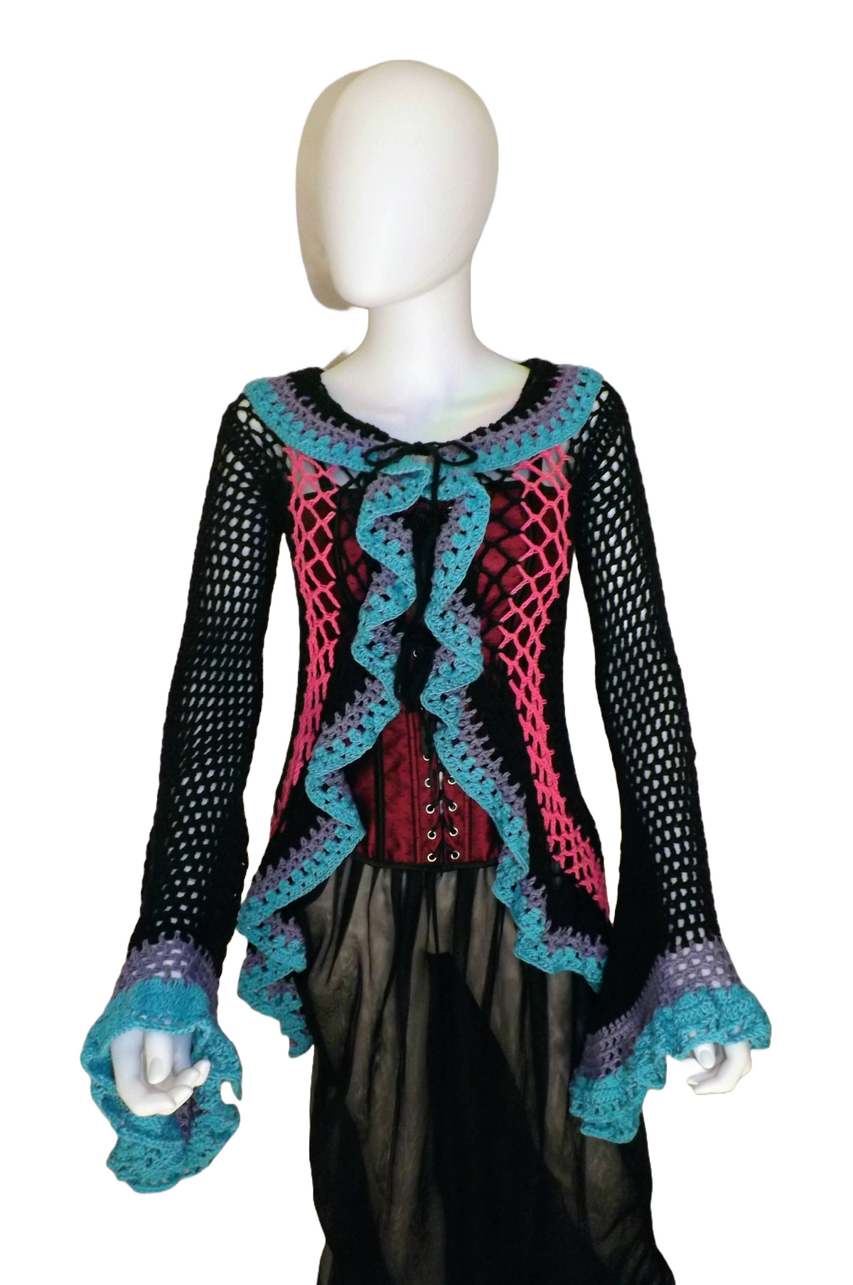 A lacy crochet duster coat with long bell sleeves