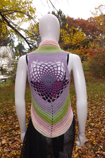 A crochet crop top vest with web motif in pastel shades.