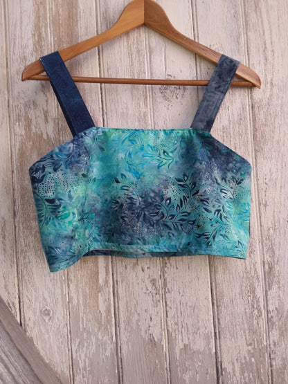 Unique teal and charcoal floral batik crop top made from repurposed textiles.