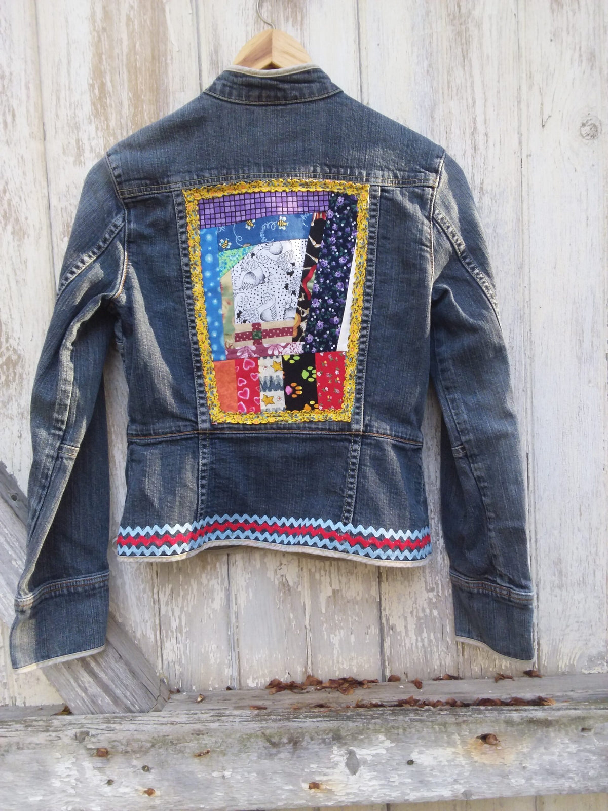 A patchwork panel on a denim jacket