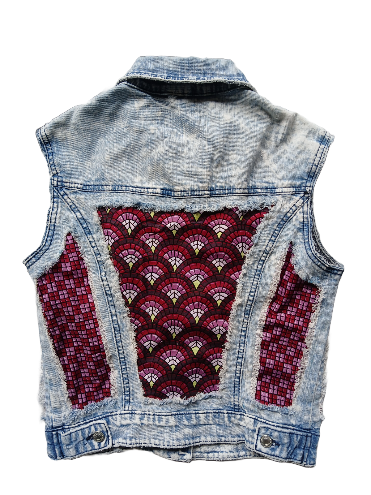 A raw denim upcycled vest with art deco fabric panels