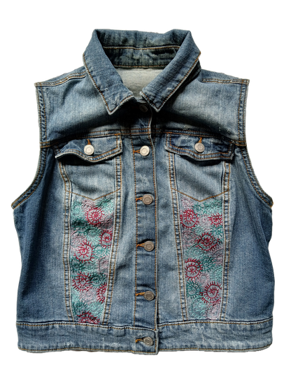 Embroidery spirals on an upcycled denim vest