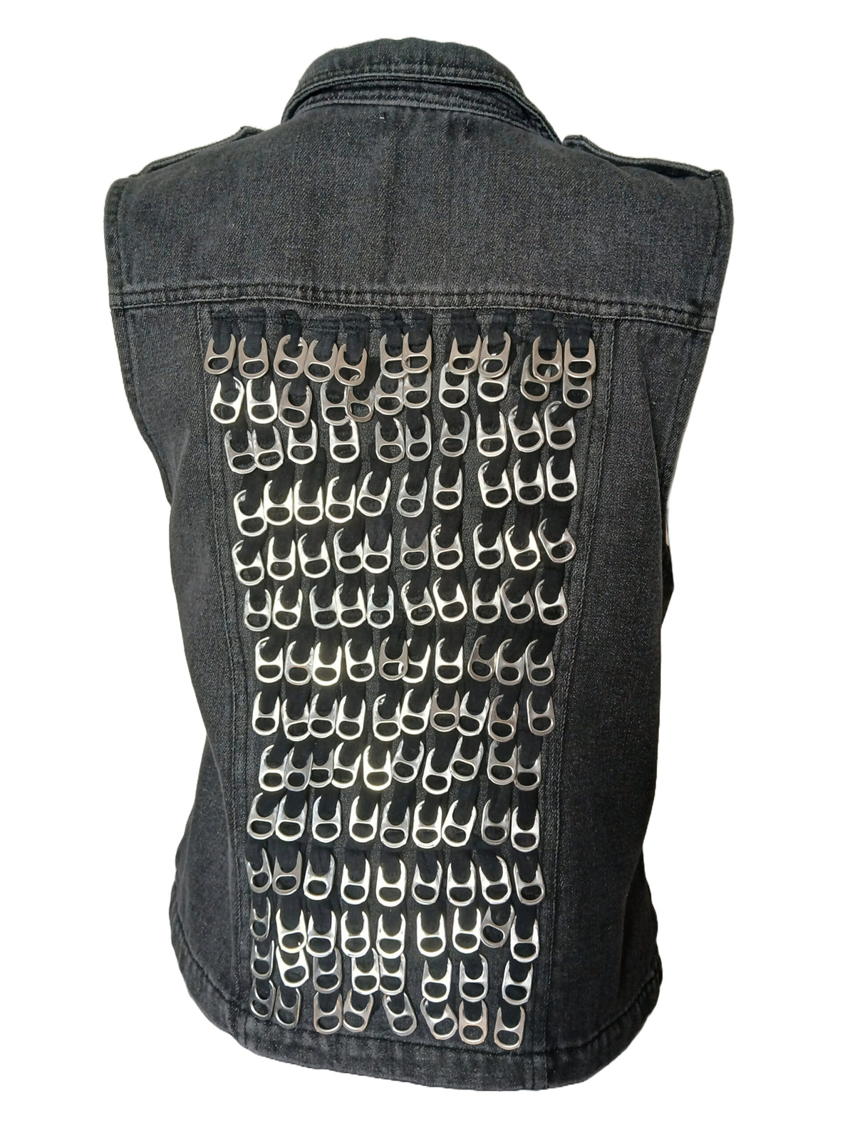 A denim vest adorned with numerous silver-colored pull tabs creating a pattern on the back.