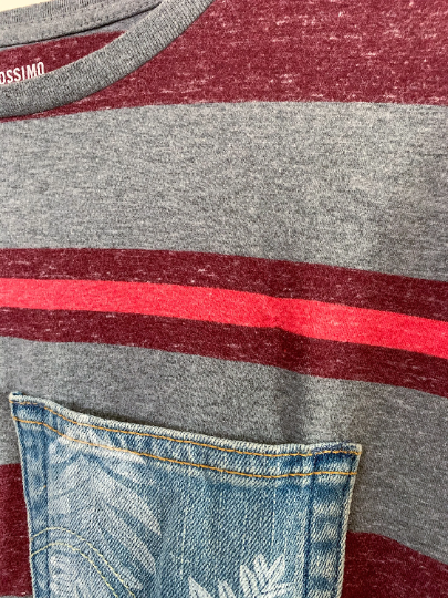 A striped t - shirt with a denim pocket.
