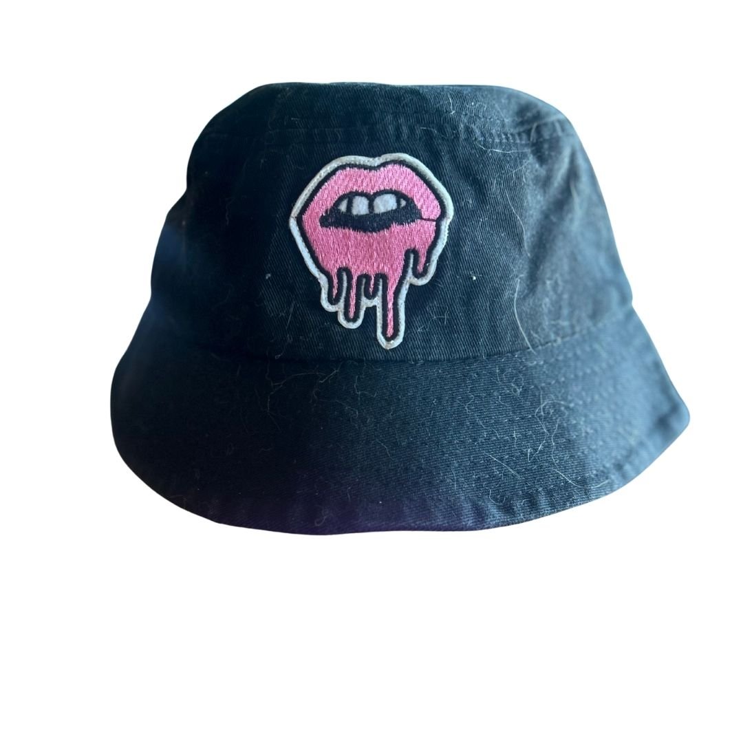 Upcycled Black Drippy Lips Bucket Hat by The Modern Alien