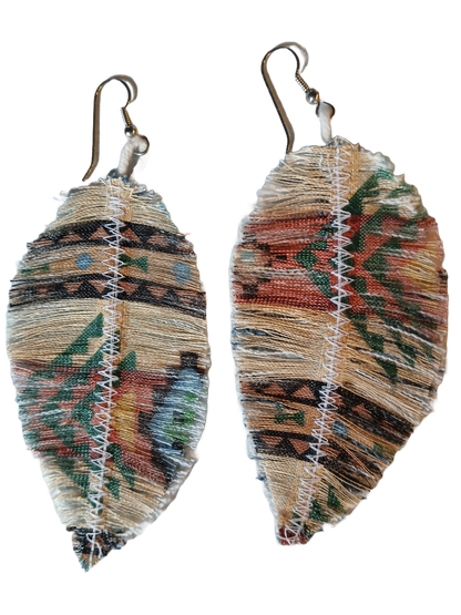 Southwest geometric fabric and denim feather earrings have a geometric design