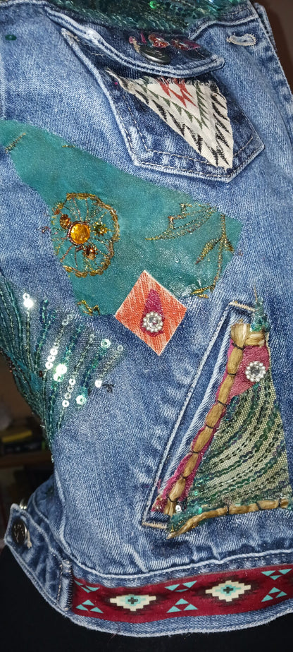 A denim jacket with beads and sequins on it.