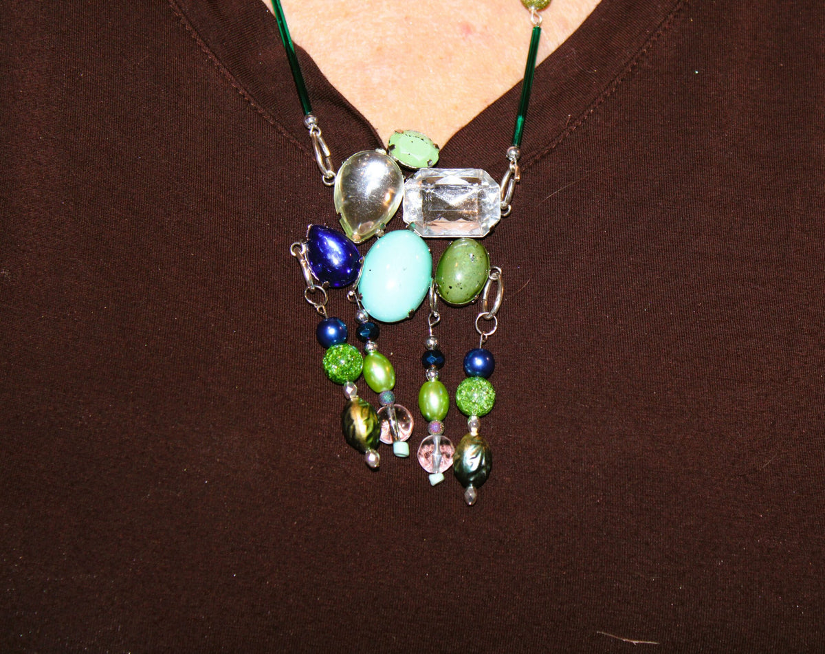 A woman wearing a necklace.