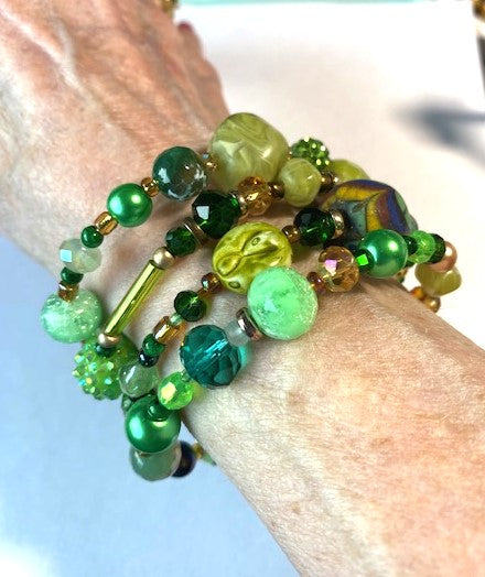Green wrap beaded bracelet on wrist