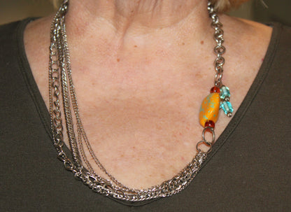 A woman wearing a necklace.