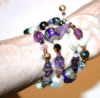 view of purple beaded bracelet on the wrist