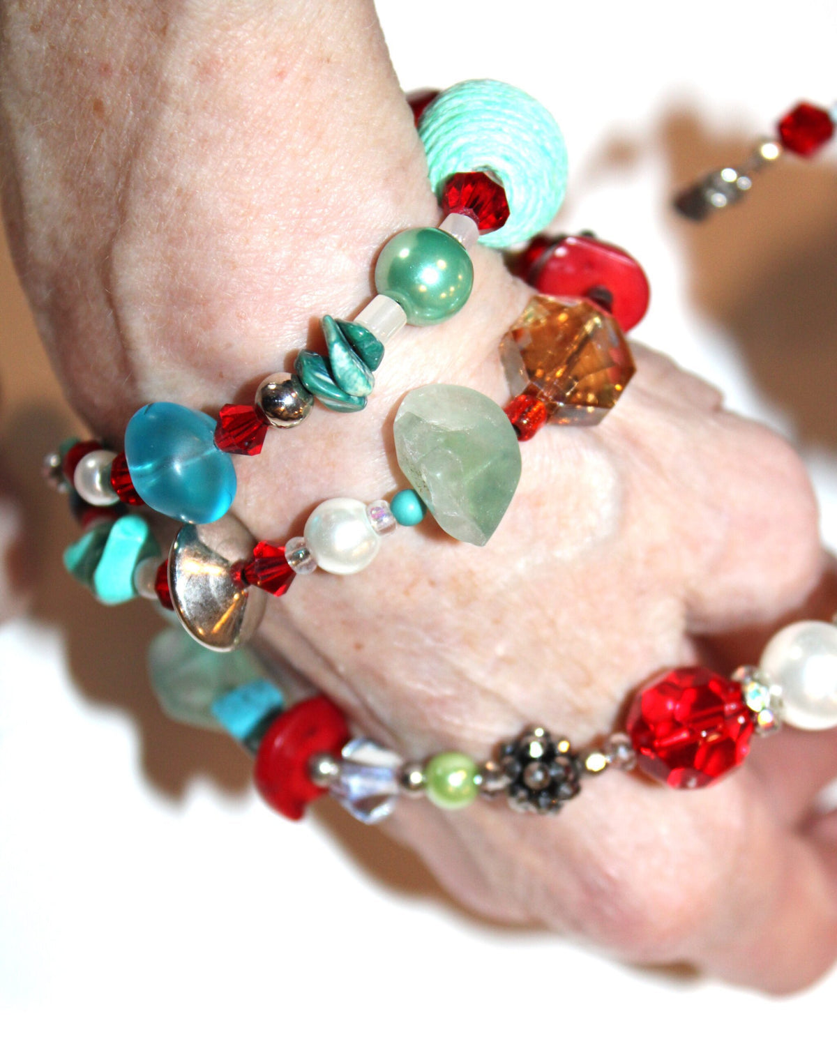 view of wrap multicolor beaded bracelet being wrapped around the wrist