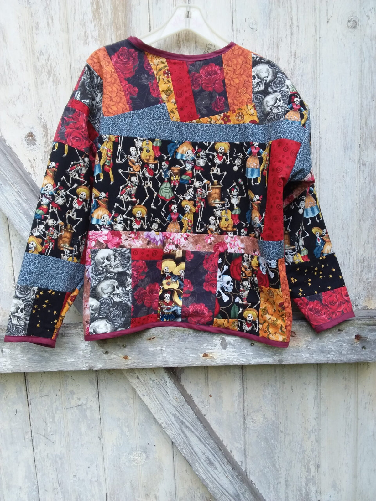 Unique quilted jacket with Day of the Dead, skulls, flowers and bold colors