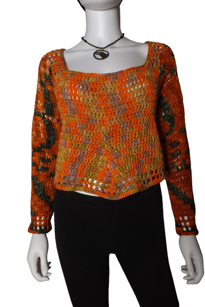 A loose fitting crochet sweater with long sleeves in green, yellow and orange colors.