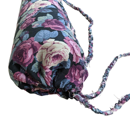 A yoga bag with a floral pattern on it.