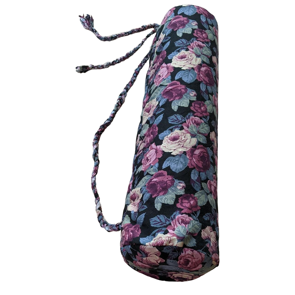 A yoga mat with a floral print on it.