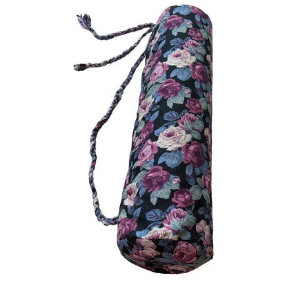 A yoga mat with a floral print on it.