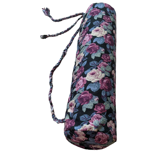 A yoga mat with a floral print on it.