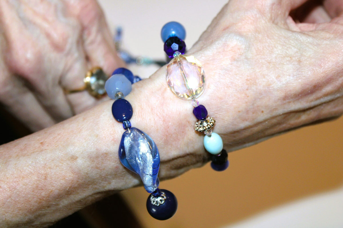 View of wrapping the blue bracelet around wrist