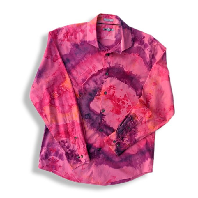 a pink and purple shirt with a tie dye pattern.