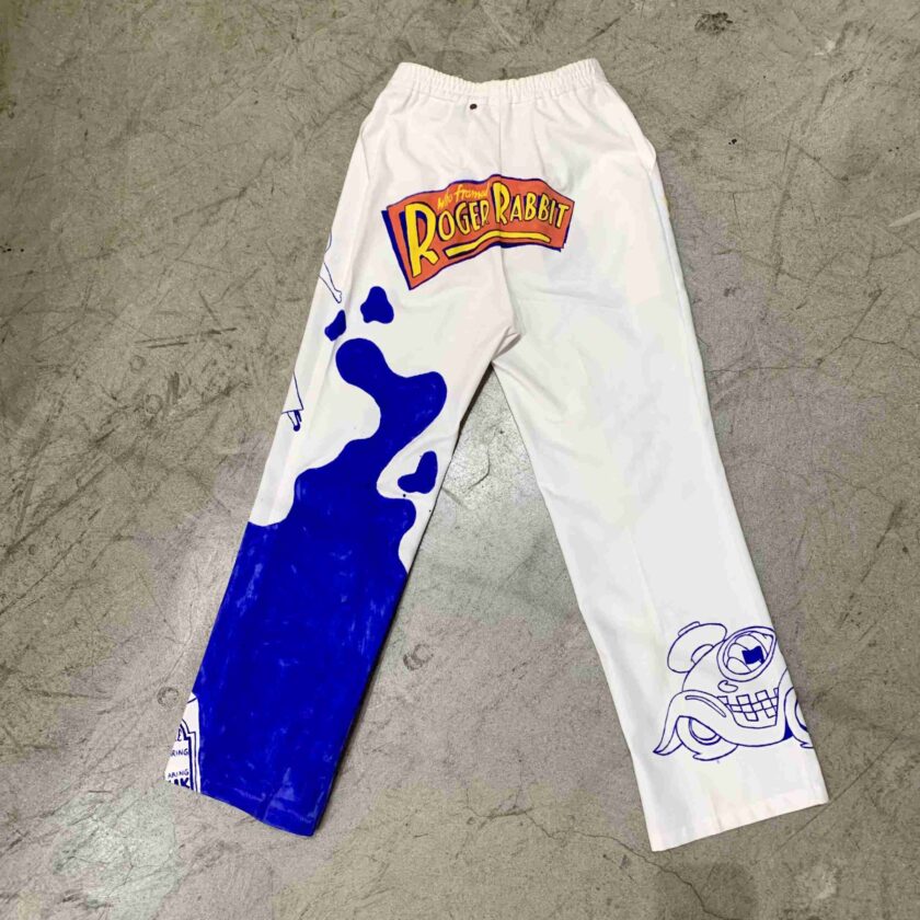 a pair of white and blue pants with a cartoon character on it.